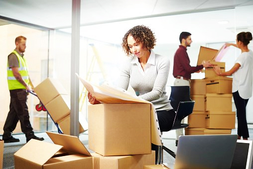 Office furniture being moved